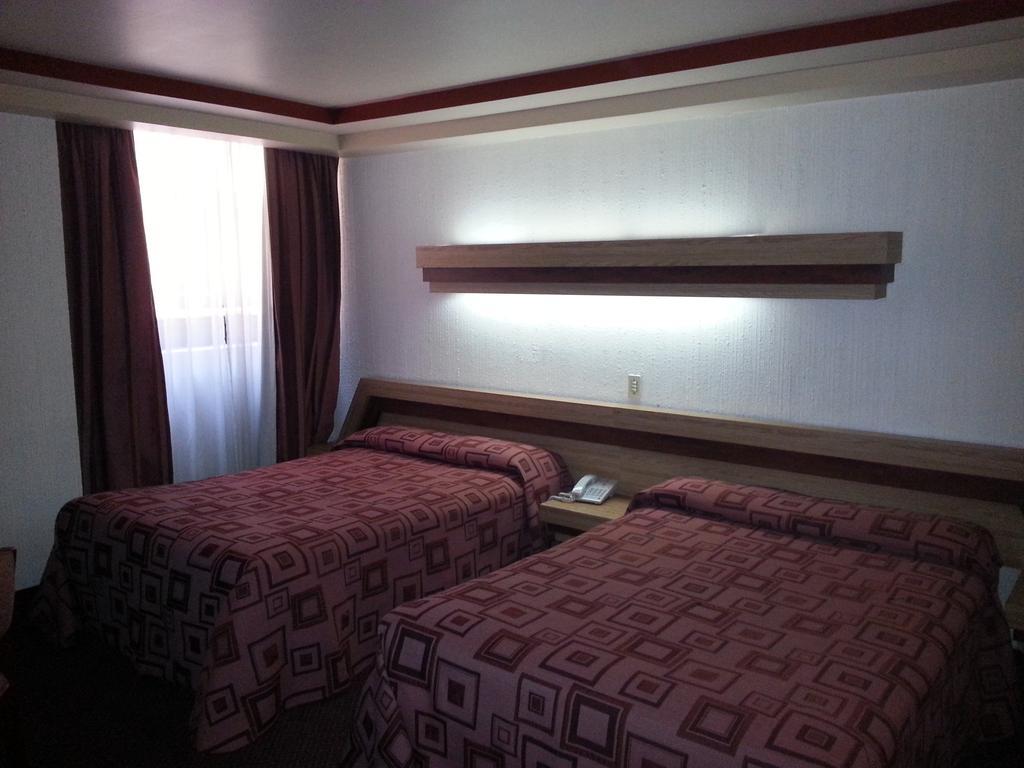 Hotel Puebla Meksika Oda fotoğraf
